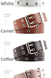 Detail of multi-color punk belts with double grommets and silver buckles in a row