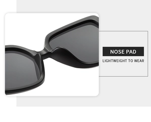 Detail view of integrated nose pads on black sunglasses for lightweight comfort wear