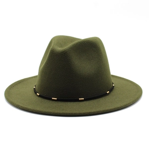 Detail of army green wool felt fedora hat featuring black band with gold metal accents