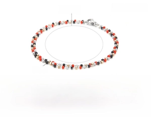 Détail d'un bracelet bohème en acier inoxydable avec des perles de cristal rouges et noires