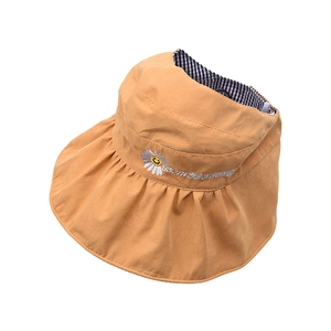 Ginger yellow children's sun hat with daisy embroidery and wide ruffled brim for summer