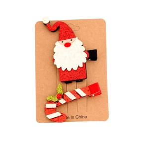 Christmas hair clip set featuring glittery Santa Claus and candy cane on card