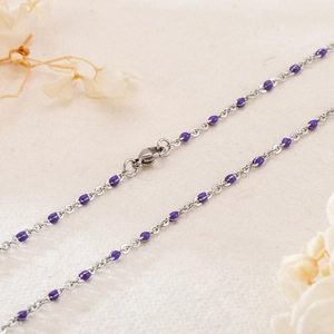 Minimalist titanium steel beaded necklace with purple resin accents and lobster clasp