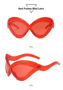 Front and side view of futuristic oversized cat eye sunglasses with red infinity frames