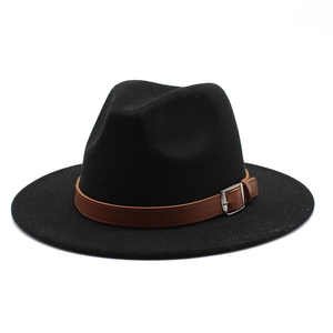 Detail of black fedora hat with flat brim and brown leather band with silver buckle