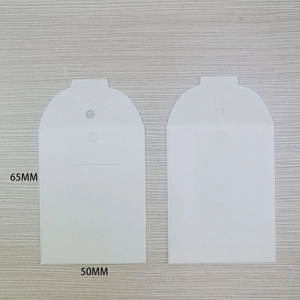 Detail showing 50x65mm white paper jewelry display cards for earrings and necklaces