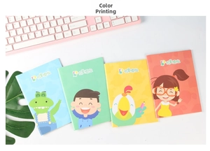 Close-up of four colorful notebook covers with cute cartoon characters and vibrant designs