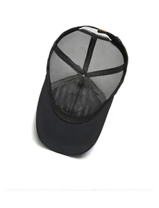 Internal detail of breathable black mesh baseball cap with metal adjustment buckle