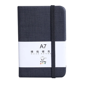 A7 minimalist black hardback pocket notebook with textured cover and elastic strap