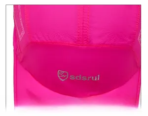Macro detail of the stitching and mesh fabric on the rose pink quick-dry sports cap