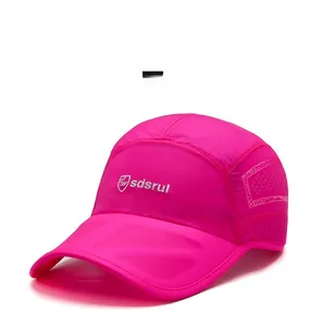 Close-up of lightweight breathable mesh fabric and logo on rose red baseball cap