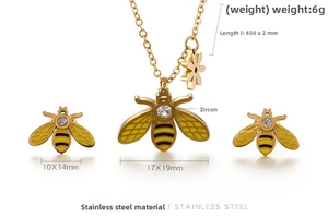 Detailed view of titanium steel bee jewelry set with white zircon and enamel wings