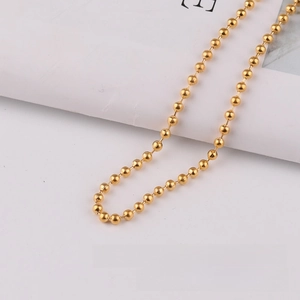 Detailed close-up of 3.2mm gold bead chain links with high polish metallic finish