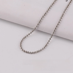 Macro shot of 3.2mm gold bead chain with high-quality polished metallic finish