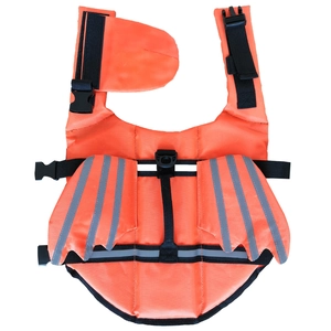 Détail du gilet de sauvetage orange pour chien avec ailes réfléchissantes et poignée