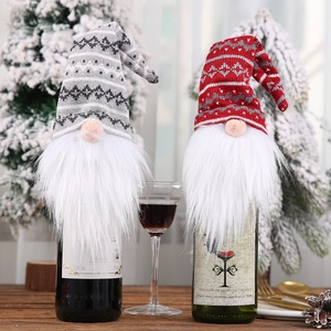 Christmas gnome wine bottle covers in red and grey knit with fluffy white beards