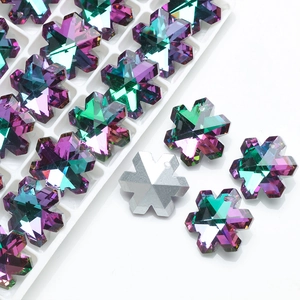 Macro detail of hexagram star crystal pendants with gradient iridescent finish and hole