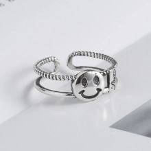 Detailed view of S925 sterling silver smile ring with braided texture and hallmark