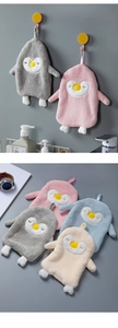 Close-up of penguin-shaped microfiber hand towels with hanging loops in four soft colors