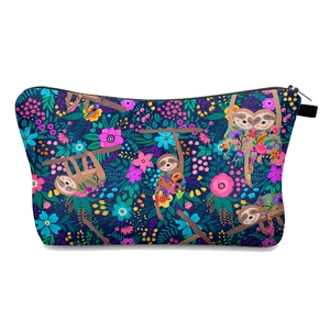 Navy blue makeup bag with digital sloth and floral print for travel organization