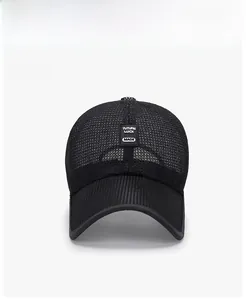 Detailed front view of black mesh baseball cap with breathable fabric and square logo label