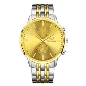Business men's quartz watch with gold and silver steel strap and large gold dial