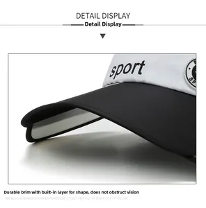Detail view of the retractable sun visor with sport logo and reinforced curved brim