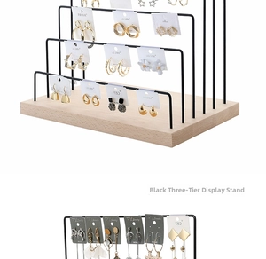 Three-tier black metal earring display stand with natural solid wood base organizer