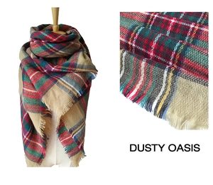 Close-up of colorful checkered cashmere-like scarf fabric texture and tassel details