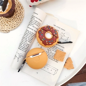 Creative chocolate donut silicone case for AirPods Pro with metal hook on book background