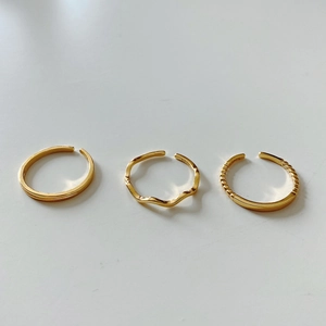 Three-piece set of adjustable S925 sterling silver gold rings with minimalist designs