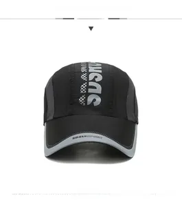Close-up of quick-dry mesh panels and printed letters on this athletic baseball cap