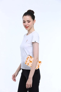 Waterproof Corgi print makeup bag shown underarm to demonstrate its soft texture and size