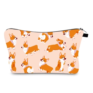 Detail of the cute Corgi print on a soft pink waterproof makeup storage bag