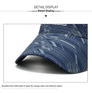 Detailed macro view of the curved brim on a quick-dry baseball cap with geometric prints