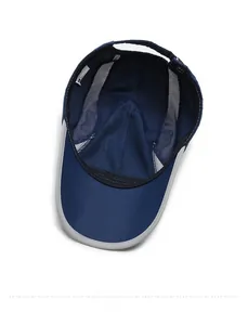 Detailed view of the breathable mesh lining and fine stitching of the navy baseball cap