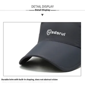 Detailed close-up of dark grey quick-dry baseball cap with sturdy brim and professional stitching