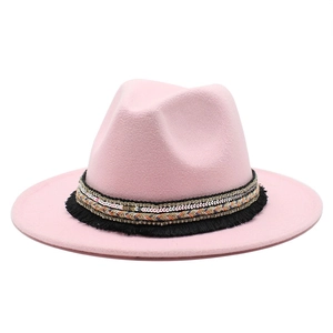 Pink wide brim wool fedora hat featuring an ethnic ribbon with tassels and sequins