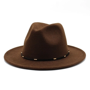 Detail of dark brown wool fedora hat with black rope and gold metal accents