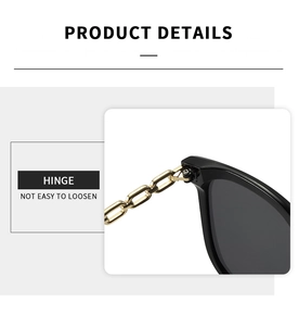 Détail de la charnière en métal doré durable sur des lunettes de soleil carrées noires