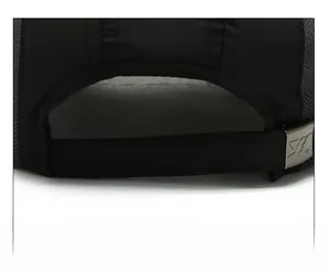 Detail of adjustable strap with silver metal buckle on a black mesh baseball cap