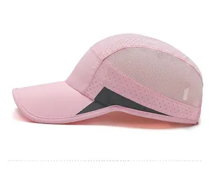 Detail view of pink kids sports cap with breathable side mesh and quick-dry fabric