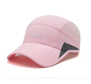 Detail of pink quick-dry sports cap featuring laser-cut ventilation holes and mesh panels