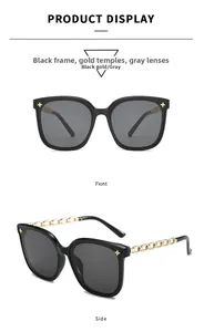 Détails de lunettes de soleil oversize noires avec branches en chaîne dorée et étoiles