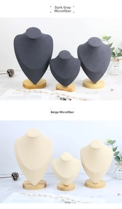 Detail view of microfiber jewelry bust stands with solid wood base in grey and beige