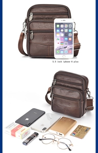 Detail of dark brown lychee leather waist bag showing large capacity with four zipper pockets