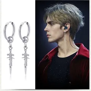 Detail view and model wearing silver sword drop hoop earrings in retro punk style