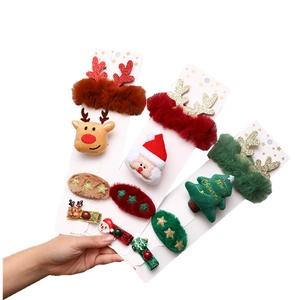 Three-card Christmas hair accessories set with Santa Claus, reindeer, and tree designs