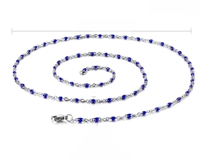 Detail of blue resin bead chain necklace in stainless steel with lobster clasp