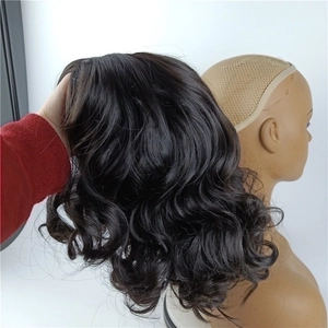 Shoulder-length burgundy wavy bob wig for women showing realistic curls and fiber texture